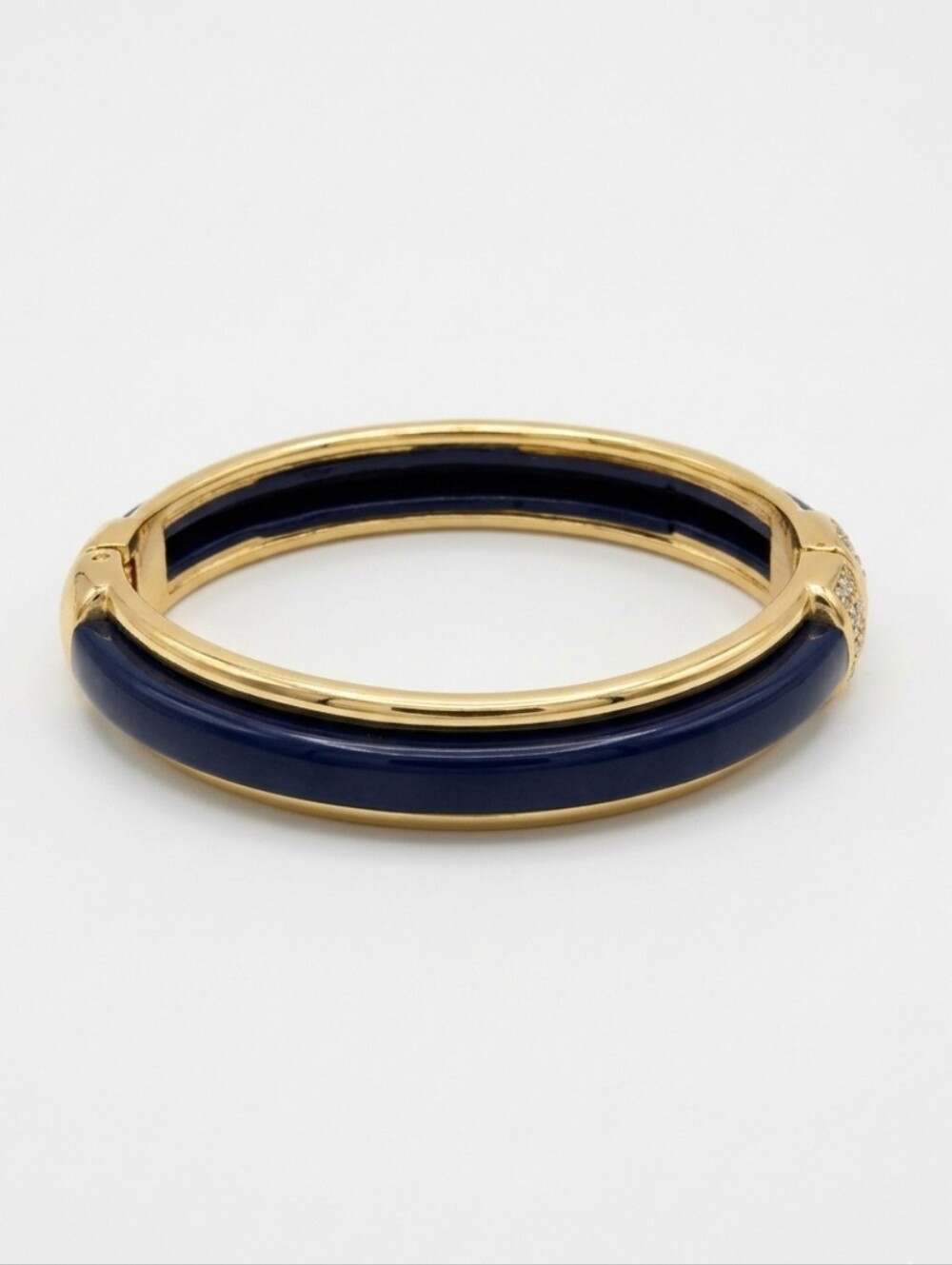 Gold Tone Hinged Bangle With Navy Blue Enamel Inlay